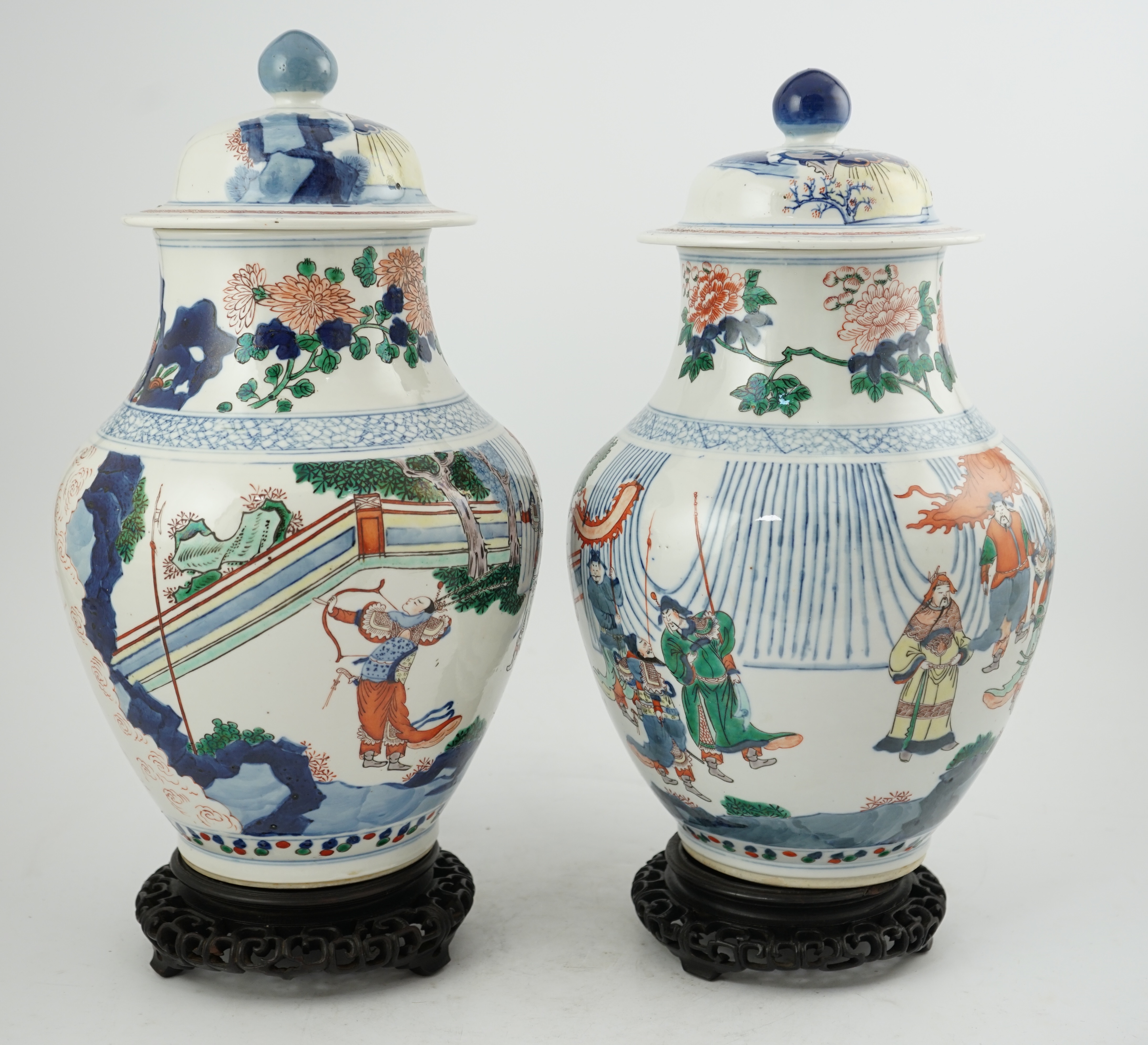 A pair of large Chinese wucai jars and covers, late 19th century